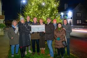 The donation to the Harrogate-based suicide prevention charity by volunteer members of Kirk Deighton Events followed a successful Christmas lights switch-on in the village. (Picture contributed)