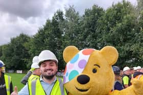 James Garland, EnviroVent’s Key Account Manager, with Pudsey Bear at BBC One’s DIY SOS: The Big Build for Children in Need. (Picture contributed)