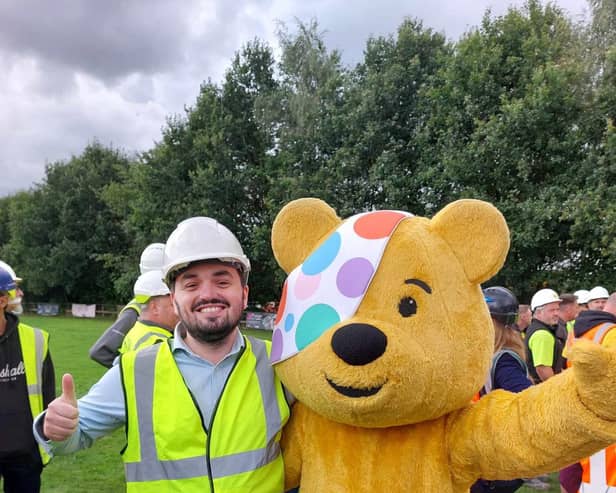 James Garland, EnviroVent’s Key Account Manager, with Pudsey Bear at BBC One’s DIY SOS: The Big Build for Children in Need. (Picture contributed)