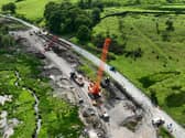 An aerial shot of work taking place on the A59 at Kex Gill