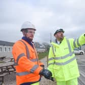 Transport minister Richard Holden (right) with contractor representative Luke Presho at the A585 Windy Harbour to Skippool site