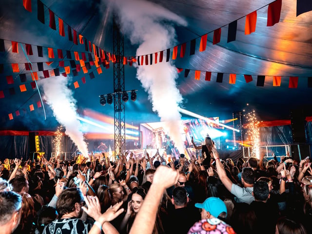 Festivalgoers enjoying the feel-good house music and vibrant atmosphere at the festival on the Stray in Harrogate