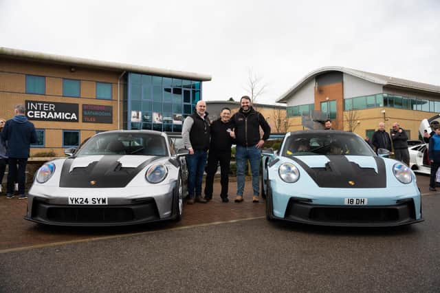 Apollo CEO Andy King, left, and MD David Moss, right, standing with Ciro Ciampi of the Petrolheadonism.club between two Porsche 992 GT3 RS at Apollo Capital’s first ever open day in Harrogate