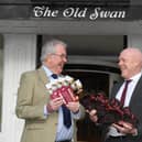 Promoting a Friends of Harrogate Hospital charity event - From left,  John Fox and David Rotson with event leaflets and a galloping horses sculpture outside the Old Swan Hotel in Harrogate. (Picture Gerard Binks)