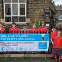 Rare honour for Harrogate district school - Children from Glasshouses Community Primary School  with the new GOLD UNICEF banner. (Picture contributed)