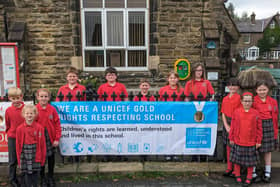 Rare honour for Harrogate district school - Children from Glasshouses Community Primary School  with the new GOLD UNICEF banner. (Picture contributed)
