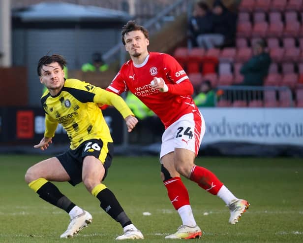 Grant Horton, left, in action for Harrogate Town during Saturday's 1-1 draw at Crewe Alexandra. Picture: Matt Kirkham
