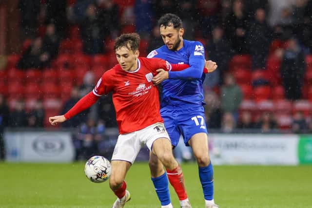Harrogate Town midfielder Levi Sutton in action at Gresty Road during the Sulphurites' previous visit to Crewe Alexandra, in February 2024. That game ended in a goalless draw. Pictures: Matt Kirkham