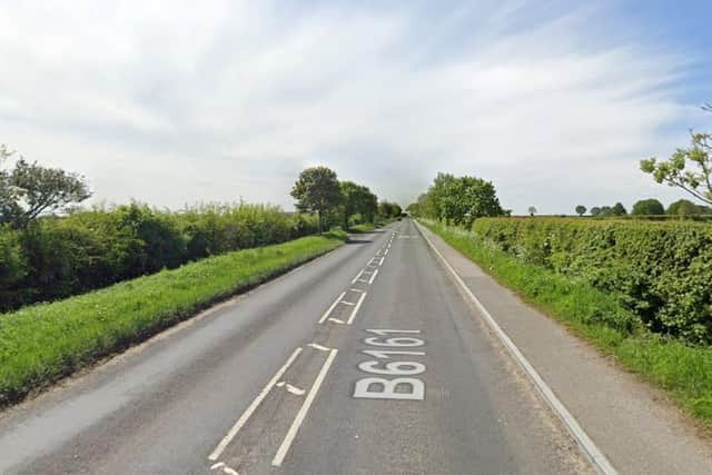A major road in Harrogate was forced to close following a road traffic collision which involved a police car