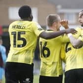 Harrogate Town players celebrate after Matty Daly fired them into a first-half lead against Tranmere Rovers. Pictures: Paul Thompson