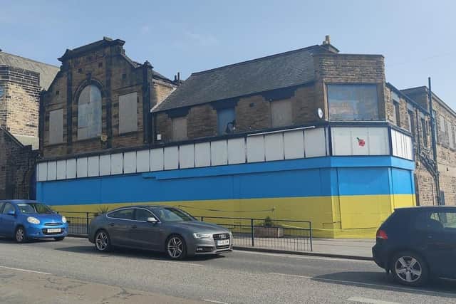 Starbeck’s former McColl’s supermarket building has been painted in the colours of the Ukraine flag