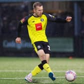 Harrogate Town midfielder Stephen Dooley in action during Saturday's FA Cup first-round success at Marine. Pictures: Matt Kirkham