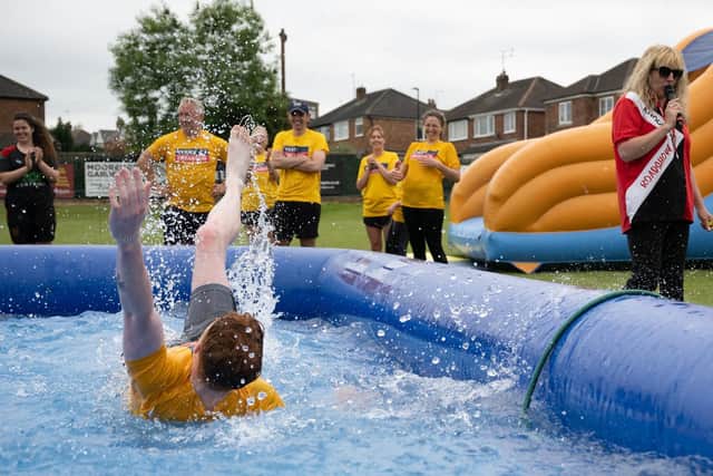 Josh Burns of Verity Frearson's team during It’s A Knockout at the Harrogate Hospital & Community Charity (HHCC) summer extravaganza.