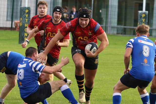 Harrogate Pythons' Hugh Tatlow makes a break for the try-line.