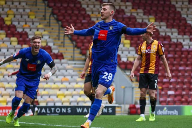 Matty Daly celebrates after scoring what proved to the winning goal in Harrogate Town's FA Cup first-round victory over Yorkshire rivals Bradford City at Valley Parade last season. Picture: Matt Kirkham