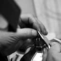 A skilled craftsman at Ogden of Harrogate jewellers restoring one of the most famous historical artefacts for public display. (Picture contributed)