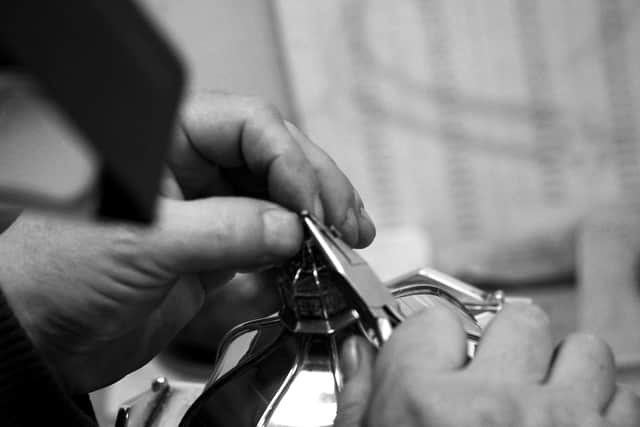 A skilled craftsman at Ogden of Harrogate jewellers restoring one of the most famous historical artefacts for public display. (Picture contributed)