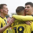 Ellis Taylor takes the congratulations of his Harrogate Town team-mates after putting them 2-1 up against Fleetwood. Pictures: Paul Thompson/ProSportsImages