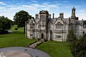 A front view of Moor Park Hall, in which a two-bedroom apartment is up for sale.