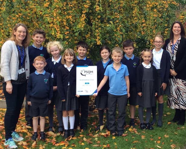 Children and staff at Rossett Acre Primary School are thrilled to have been awarded the PSQM