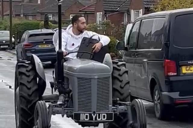 Harrogate Neighbours 'angel' Zac Evans on the road to mark National Meals On Wheels Week. (Picture contributed)