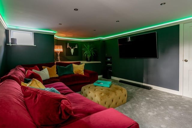 The plush cinema room on the lower ground floor of the house.