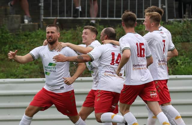 Mike Morris, left, celebrates with his Harrogate Railway after netting his side's late winner at Nostell Miners Welfare. Picture: Craig Dinsdale