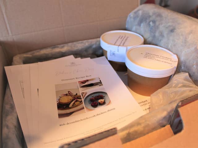 Opening the recipe box after delivery.