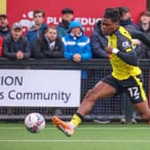 Sam Folarin slots home his first goal during Harrogate Town's FA Cup first-round win at Marine. Pictures: Matt Kirkham