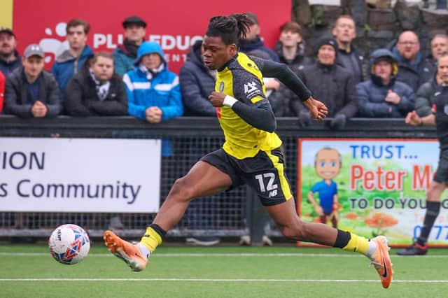 Sam Folarin slots home his first goal during Harrogate Town's FA Cup first-round win at Marine. Pictures: Matt Kirkham