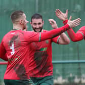 Luke Stewart, right, celebrates after opening the scoring in Harrogate Railway's NCEL Division One win over Staveley Miners Welfare. Picture: Craig Dinsdale