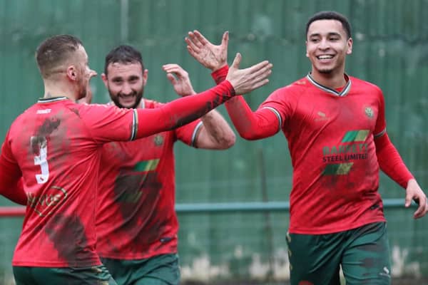 Luke Stewart, right, celebrates after opening the scoring in Harrogate Railway's NCEL Division One win over Staveley Miners Welfare. Picture: Craig Dinsdale