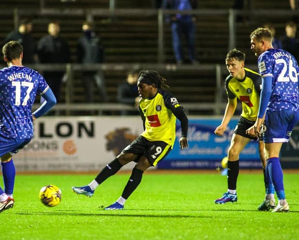 Harrogate Town forward Abraham Odoh takes aim at the Carlisle United goal during Tuesday night's EFL Trophy clash at Brunton Park. Pictures: Matt Kirkham