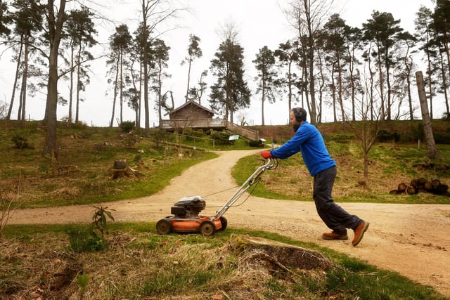 Gardener Ben Rowlett getting the garden ready for opening