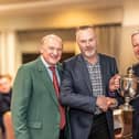 Oakdale GC captain Paul Dutton, left, the club's Golfer of the Year Mark Hudson, centre, and Howard Clark. Picture: Submitted