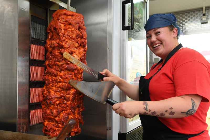 Lisa Dyson cutting the kebab meat on the Lebanese Street Food stall