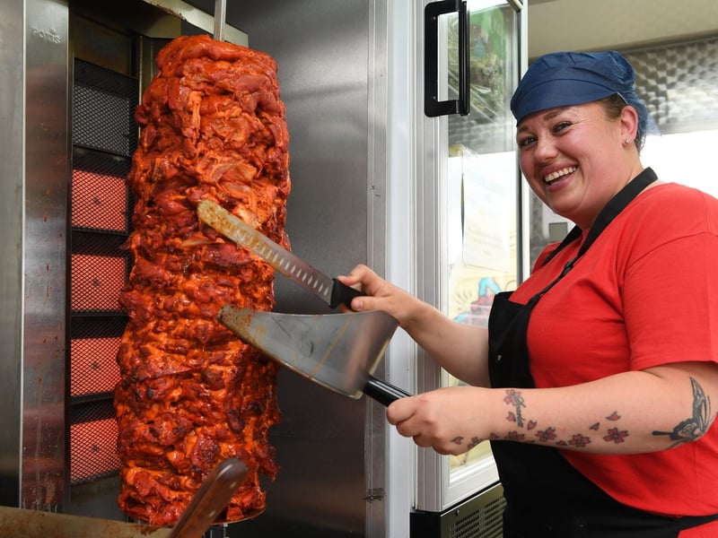 Lisa Dyson cutting the kebab meat on the Lebanese Street Food stall