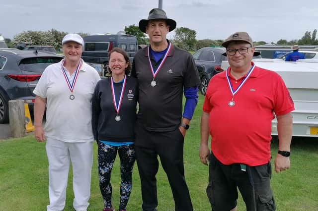 St George's archers, from left, Danny Walsh, Fiona Harris, Ian Harris and Julian Smith. Picture: Submitted