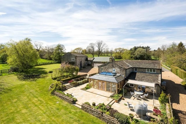 This six bedroom and four bathroom detached house is for sale with Savills for £2,500,000