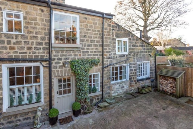 A skilfully renovated three-bedroom cottage with features of exposed brick, beams and oak panelling. There's a sitting room with wood burning stove, an inner hall with stairs, a downstairs cloakroom, dining kitchen, and a snug with French doors to enclosed gardens. To the first floor is a gallery landing, three bedrooms, one with en suite, and a shower room. The cottage has a parking space. The rear landscaped garden has patio areas and a store.
For more details contact Newby James Ltd, Knaresborough, tel. 01423 276100.