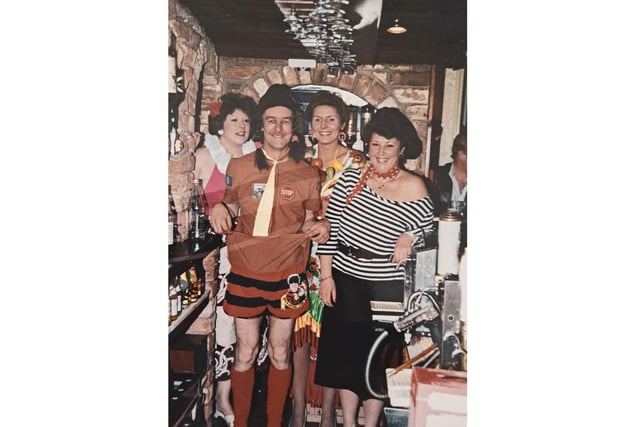 Pictured from the left: Norma Scott, Richard Smith, Marie Cluderay and Debbie Marshall enjoying a costume event in the 1990's.