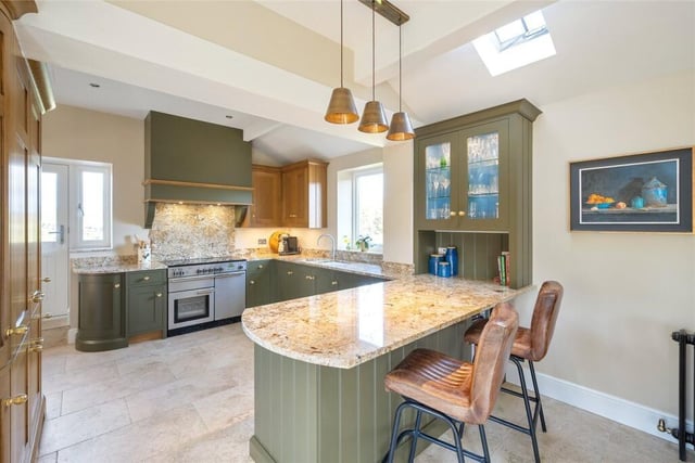 The bespoke Clarity Arts kitchen with breakfast bar.