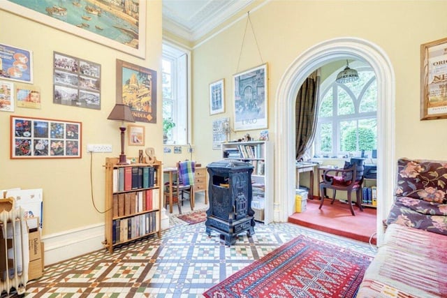 Each room has kept original features including ornate windows, floor tiles and arches.
