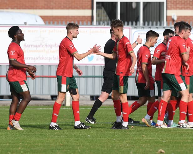 Harrogate Railway players celebrate after finding the net during Saturday's FA Vase clash with Whitley Bay. Pictures: Gerard Binks