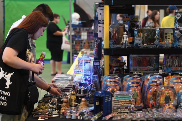 Visitors to Comic Con Yorkshire taking a look at the merchandise that is on offer