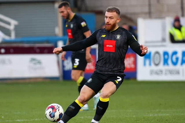 George Thomson in action during Harrogate Town's 3-3 draw with Hartlepool United at Victoria Park.