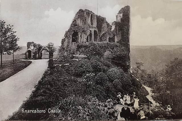 Knaresborough Castle pictured nearly 120 years ago from the postcard collection of Isabel Garbutt. Pictured on the right is the footpath from Castle Lodge that was part of the land dispute which resulted in the Castle Yard Riot. (Picture contributed)