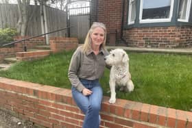 Albert the three-legged Romanian rescue dog with new owner Emma Cole.