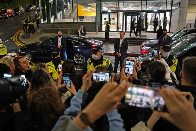 People watch the former US president Barack Obama leave the University of Strathclyde in Glasgow during the Cop26 summit.