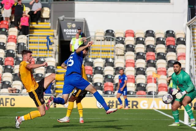 Anthony O'Connor heads Harrogate Town into a 2-0 lead early in the second half.